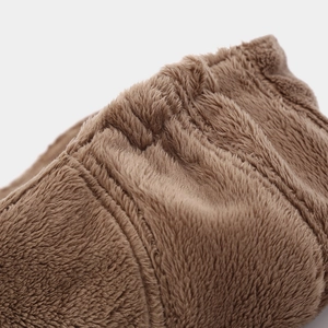 Close-up of the soft brown plush texture and elastic fold detail of the vintage beret