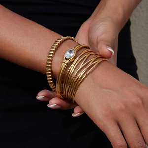 Set di bracciali in acciaio inossidabile dorato con zircone ovale per donne