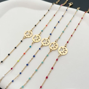 Bohemian bead bracelet with gold alloy dog paw pendant and colorful enamel beads