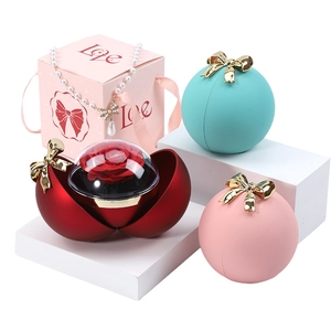 Spherical floral jewelry gift box with bow and preserved roses for rings and necklaces