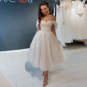 Elegant off-shoulder sweetheart wedding dress with polka dot lace mesh and tiered tulle