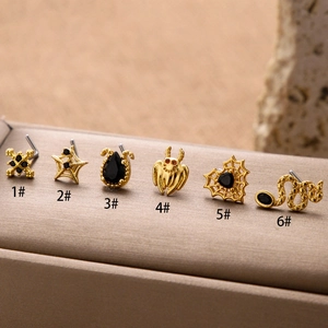 Gold stainless steel nose studs set featuring gothic spider, snake and heart designs