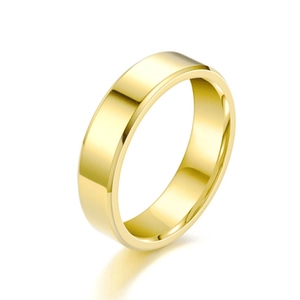 Polished golden stainless steel ring with double beveled edges on white background