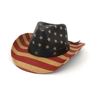 Detail of western cowboy hat featuring US flag patterns and metallic star accessories