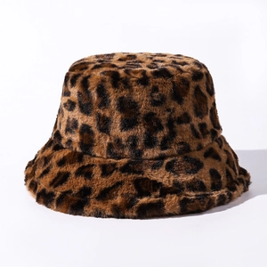 Macro view of plush leopard print faux fur bucket hat fabric with soft texture
