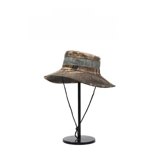 Detail of camouflage sun hat with breathable grey mesh and adjustable windproof cord