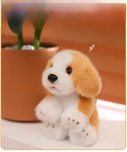 Detailed close-up of soft golden retriever plush keychain showing fuzzy fur and facial details