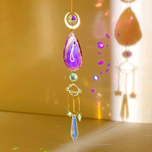 Agate slice suncatcher with crystal prisms and golden moon pendant for window decor