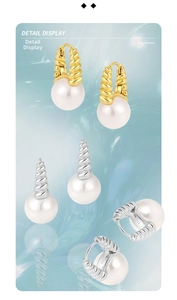 Detail shot of vintage twisted pearl earrings showing S925 silver stamp and texture