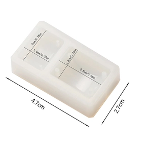 Detailed view of silicone earring mold showing heart and teardrop geometric shapes with dimensions