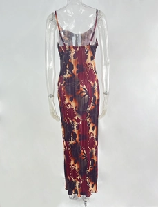 Detail view of back pleats on floral maxi dress with plissé fabric and adjustable straps