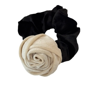 Velvet hair scrunchie with beige rose decoration on black elastic hair tie for women
