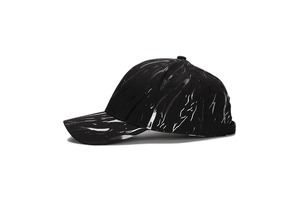 Detail of black baseball cap with silver marble print and classic curved brim