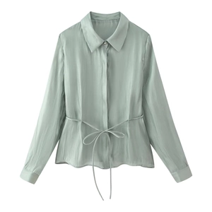 Elegant light green satin shirt for women featuring a stylish waist tie and glossy finish