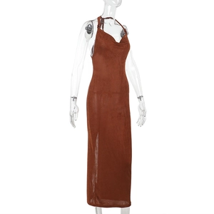 Detail of dark brown backless maxi dress featuring a halter neck and mesh fabric texture