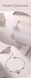 Detailed view of 925 sterling silver adjustable bracelet with round halo pendant and fine chain