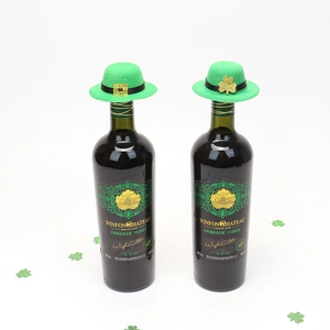 Close-up of green St. Patrick's Day mini hats with clover design on wine bottles