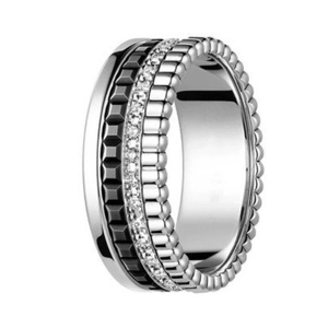 Classic silver and black layered band ring with studded pattern and sparkling stones