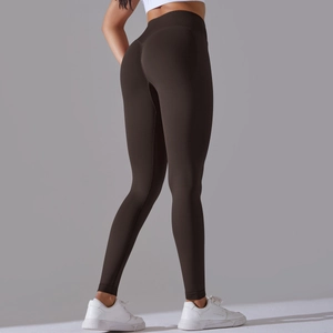 Close-up of high-waist seamless yoga leggings showing peach lift and body contouring