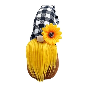 Gnome plush toy with black and white checkered hat and yellow sunflower decoration