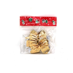 Set of gold and silver Christmas tree bows in festive snowman packaging for gift wrapping
