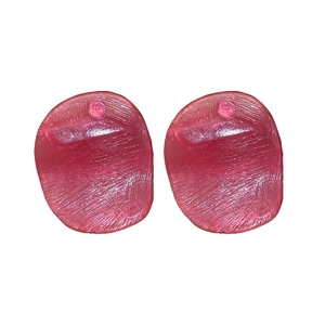 Exaggerated irregular pink round stud earrings with textured metallic finish and silver needles