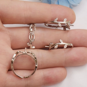 Detail showing C-shaped leaf ring base with white zircons for DIY jewelry making