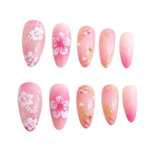 3D floral press-on nails with pink gradient almond shape and gold glitter accents