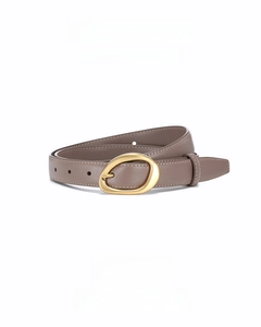 Close-up of elephant gray leather belt with elegant irregular gold metal buckle detail