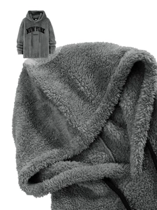 Detail of soft fleece lining and high-quality letter embroidery on grey hoodie