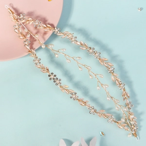 Golden handmade bridal headband with pearls, crystal leaves and floral beads