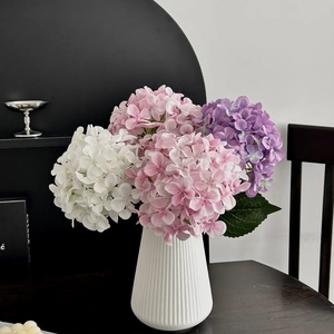 Artificial 3D printed hydrangea bouquet in a white striped ceramic vase for home decor