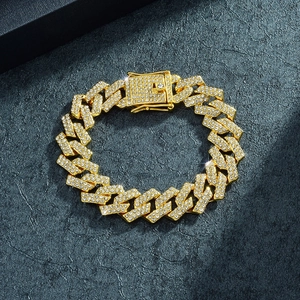 Close-up of 15mm gold-plated hip hop Cuban link chain with sparkling rhinestones