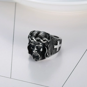 Vintage stainless steel signet ring with religious relief portrait and cross engravings