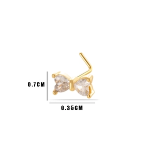 Detailed view of a gold bow nose stud with zircon and dimensions 0.7cm by 0.35cm