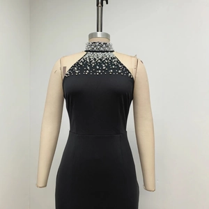Elegant black halter evening dress with pearl and rhinestone embellishments and mermaid hem