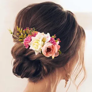 Bohemian floral bridal hair comb with white roses and pink peonies for beach weddings