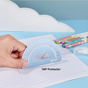 Action shot of 180 degree light blue protractor being used on a notebook