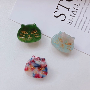 Cute cat-shaped acetate hair claws in marble green, blue and tricolor styles
