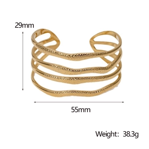 Detail view of gold stainless steel bangle with dimensions 29mm height and 55mm diameter