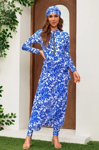 Detail of blue and white floral long-sleeve burkini with front zipper and matching hijab