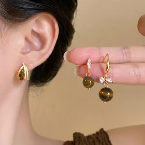 Tiger eye stone earrings set with zircon butterfly and gold finish for women