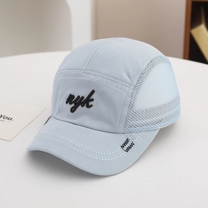 Detail of light blue mesh side panels on child's baseball cap for breathability