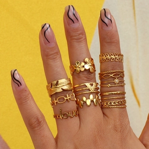 Set of 10 gold minimalist stainless steel rings featuring leaf and LOVE letter designs