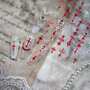 Red gothic cross nail stickers with 5D embossed lace patterns and sparkling rhinestones