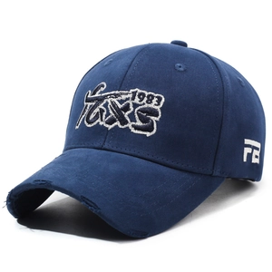 Distressed navy blue baseball cap with 1983 3D embroidery and vintage ripped brim