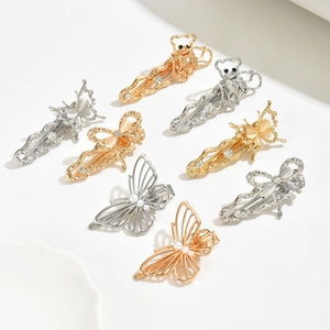 Set of 8 vintage style gold and silver butterfly hair clips with pearls and rhinestones