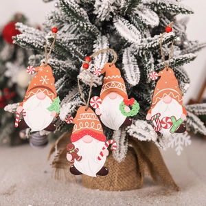 Set of four wooden Christmas gnome ornaments with red beads and natural jute hanging strings