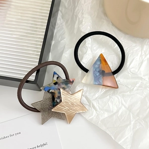 Cute star-shaped elastic hair ties with glitter and marble texture for ponytails