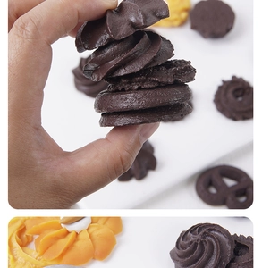Macro detail of artificial chocolate cookies showing realistic texture and brown finish